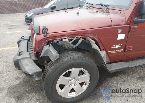 2007 Jeep Wrangler Unlimited Sahara z USA, uszkodzony, nr VIN 1J4GA59147L155674